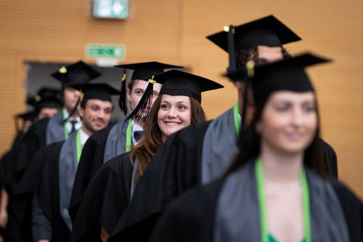 Students graduating after receiving their AP results